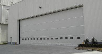 購入 耐久性 工業用布 垂直リフト 織物 ドア 最大高さ 12 メートル 耐風 120 Kmh まで 倉庫用に最適 online manufacture